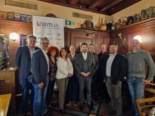 Le Comité de l'UNAM in corpore: Charles Constantin, Vincent Schläppy, Brigitte Leitenberg, Laurence Veya, Pierre-Daniel Senn, Damien Cottier, Graziano Vicario, Freddy Moret, Fabio Bongiovanni et Greg Nicaty